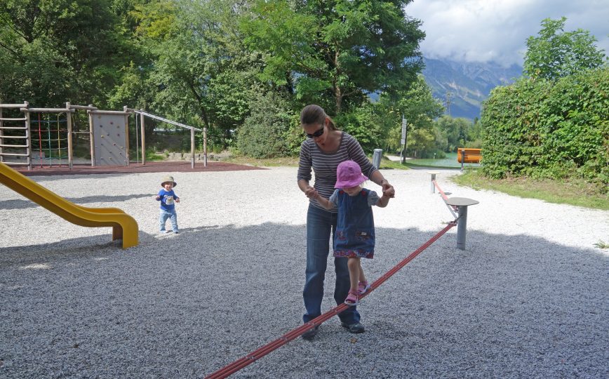 Slackline children playground at family-friendly lake in Innsbruck