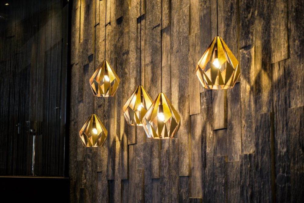 Lovely lighting against the stone wall.