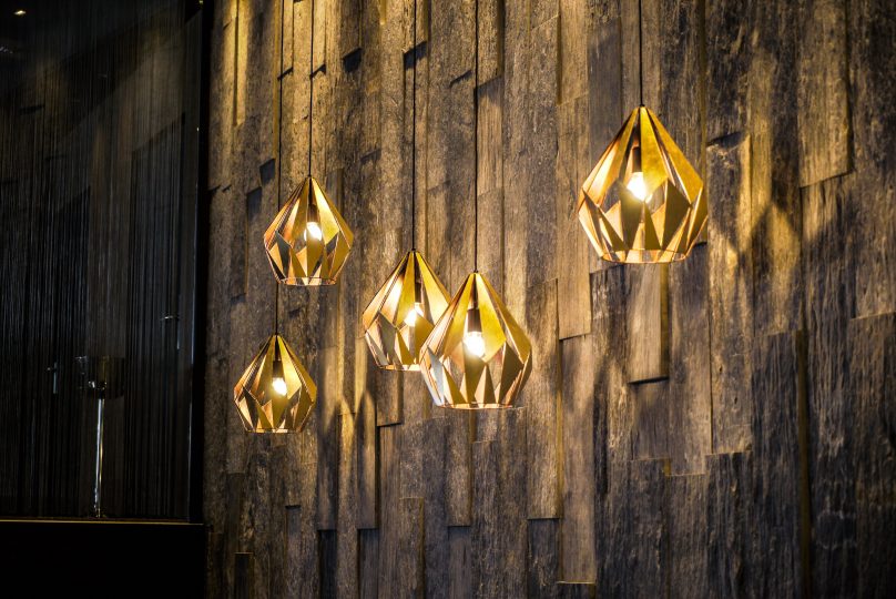 Lovely lighting against the stone wall.