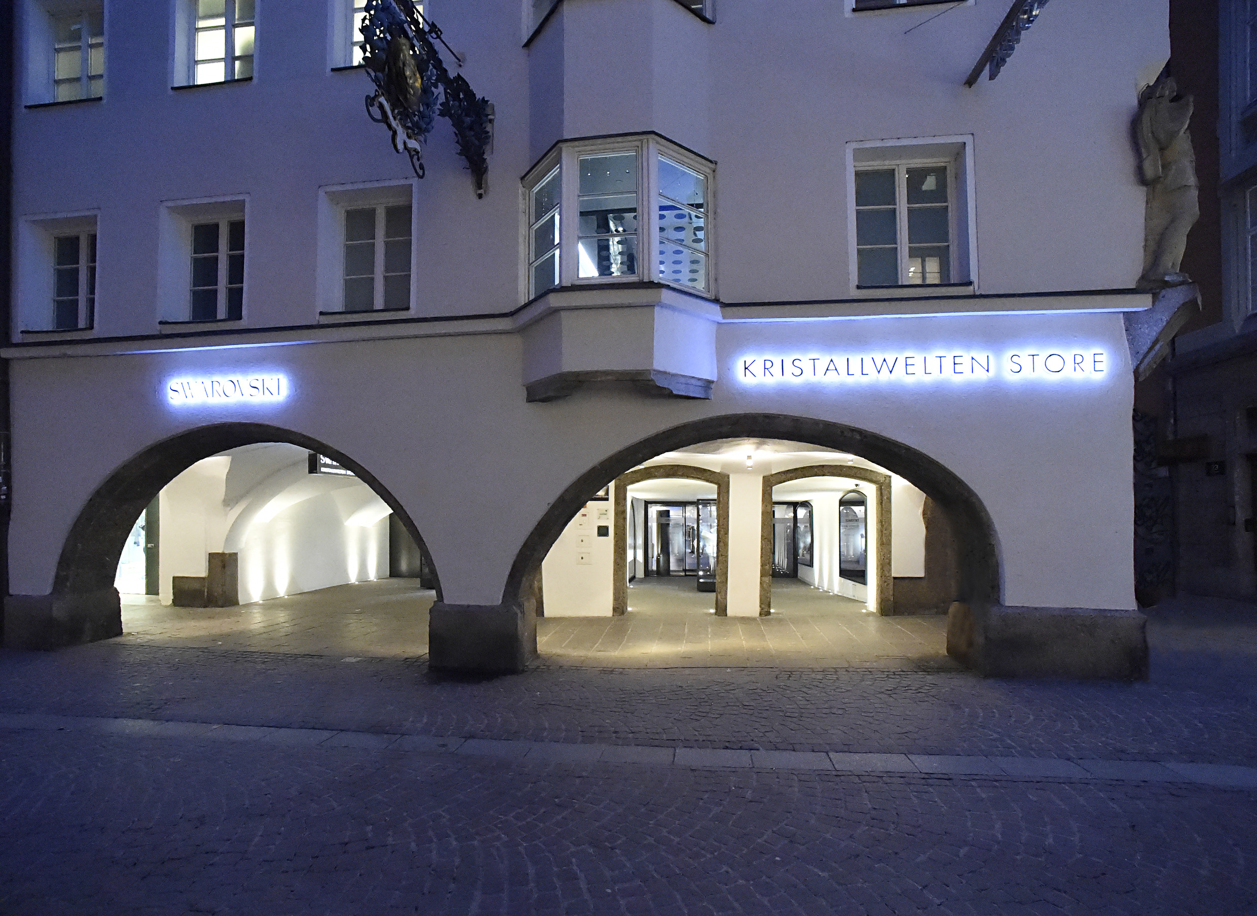 Swarovski Kristallwelten Store at night.