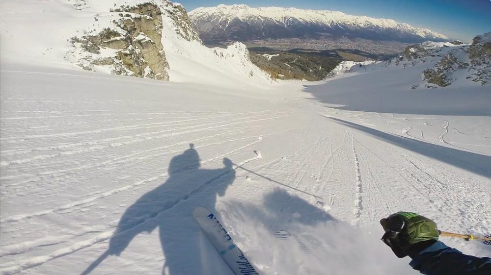 Matt Clark skis down from one of the Nockspitze couloirs towards Innsbruck, before cutting left to join the Muttereralm lifts