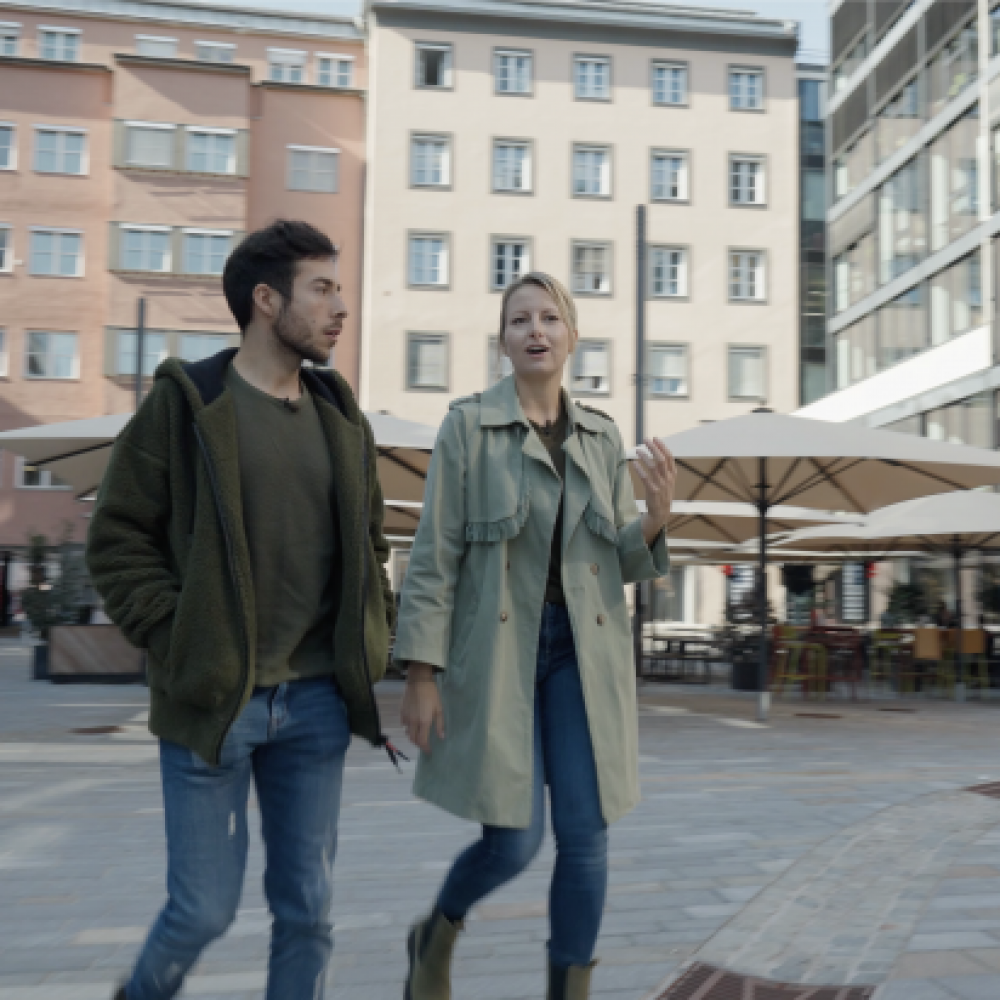 Marcel Clementi With Sabrina Engl from the Innsbruck Podcast walk through Innsbruck's Sparkassenplatz