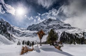 Winter hiking at the foot of the glacier