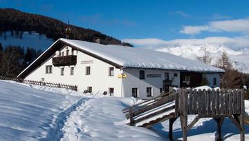 Restaurante alpino Alpengasthaus Stockerhof