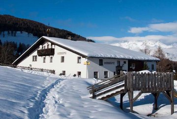 Restaurante alpino Alpengasthaus Stockerhof