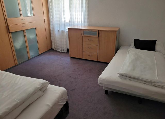 Schlafzimmer-getrennte-Betten.jpg