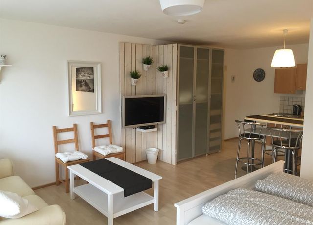 Ferienwohnung-Nigler-Studio-Garten-Bergblick-Winte.jpg