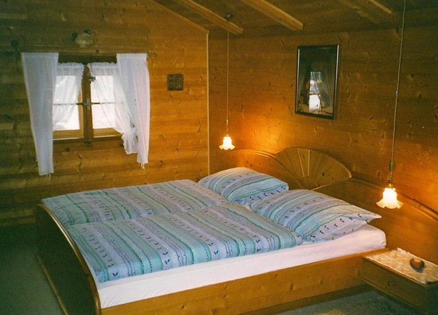 Blockhaus-Waldner-Bsp-2-Schlafzimmer.jpg